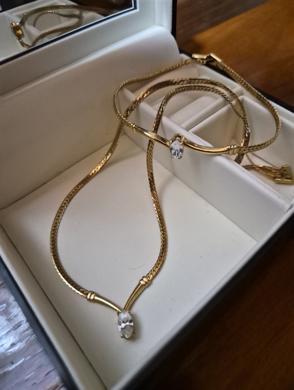 Avon 1994 Gold-Tone Necklace with Clear Crystal Pendants